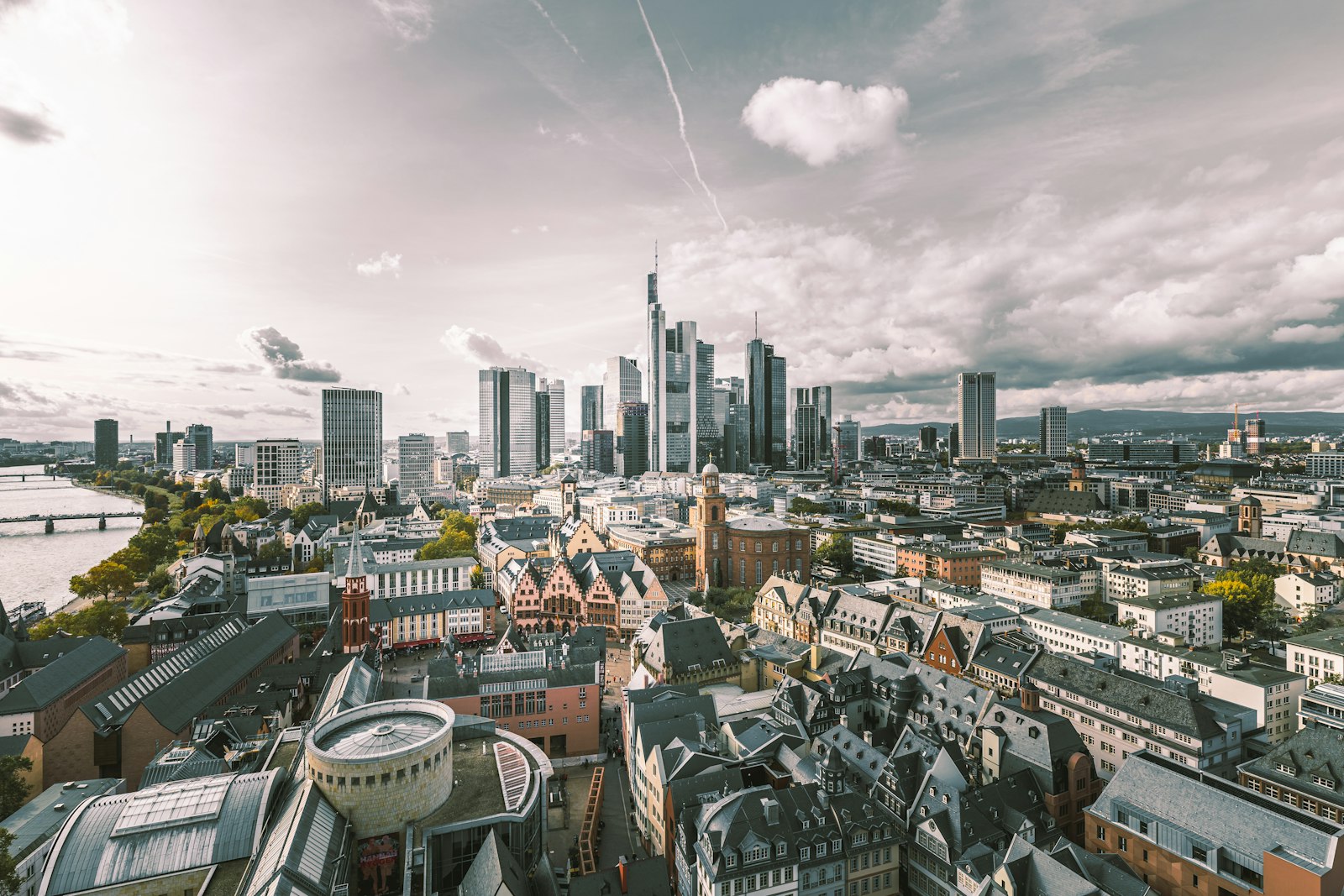 Aerial view of Frankfurt am Main, the Altstadt and Römerberg in front of the banking skyline and the river Main